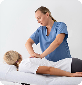 Chiropractor performing adjustment