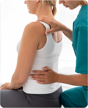 Chiropractor examining patient